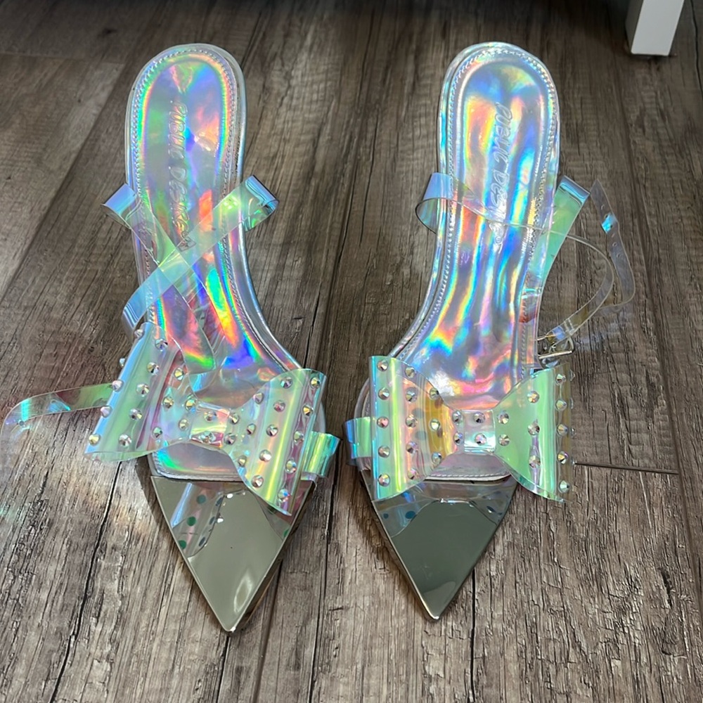 Stunning! Clear vinyl high heel sandals with rhinestone bows. Size 5